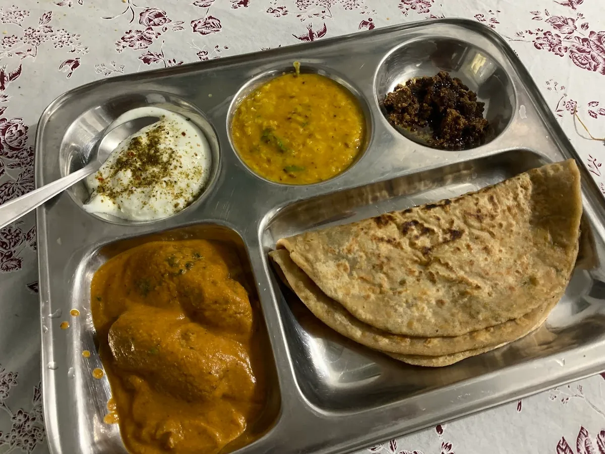 Bengali luchi frying in East Indian cooking class Rishikesh