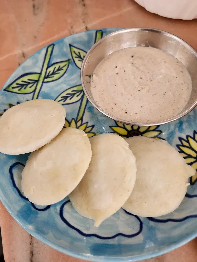 Idli steaming in South Indian cooking class Rishikesh